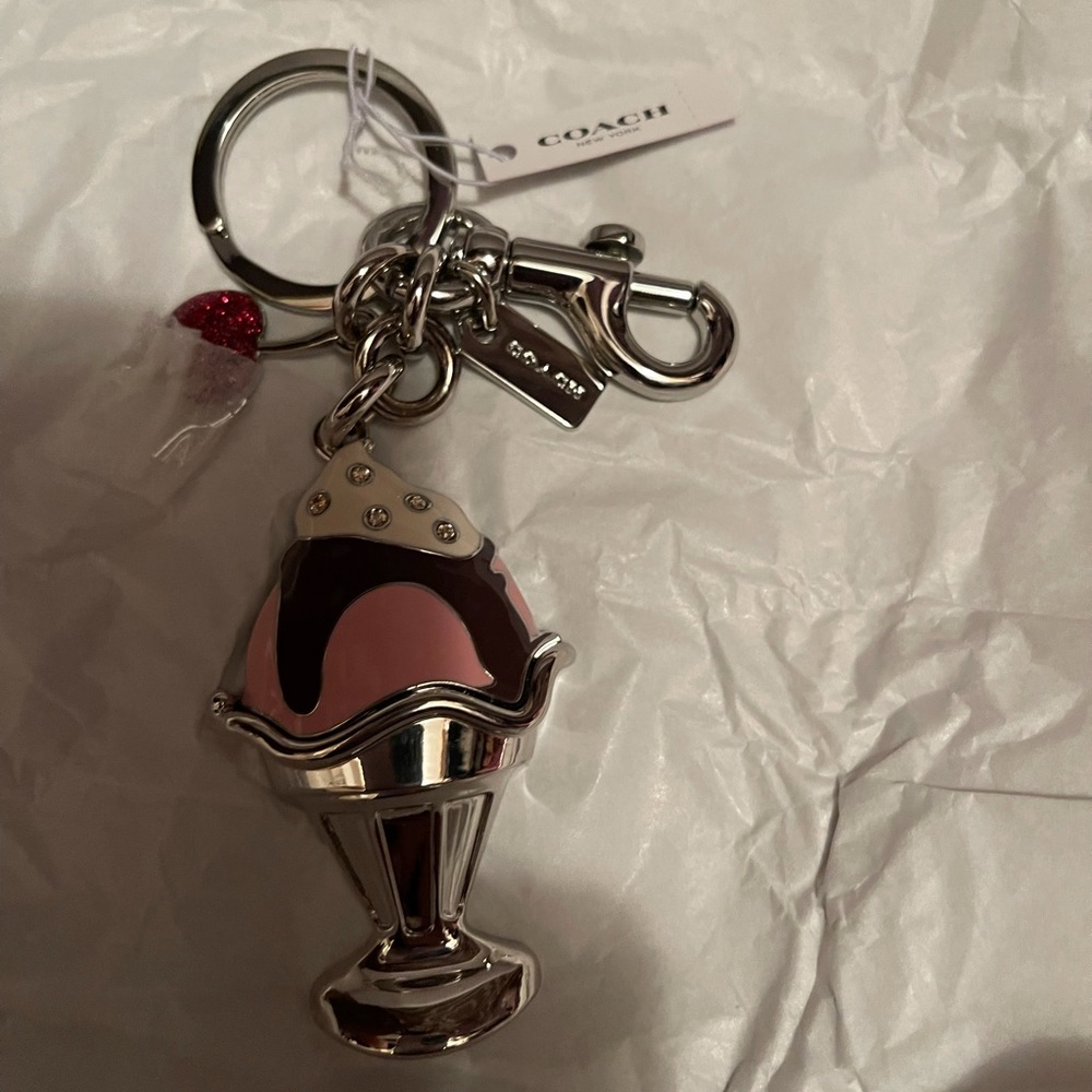 Coach charm